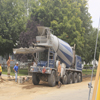 Gale Briggs Inc delivering redi-mix concrete to a project